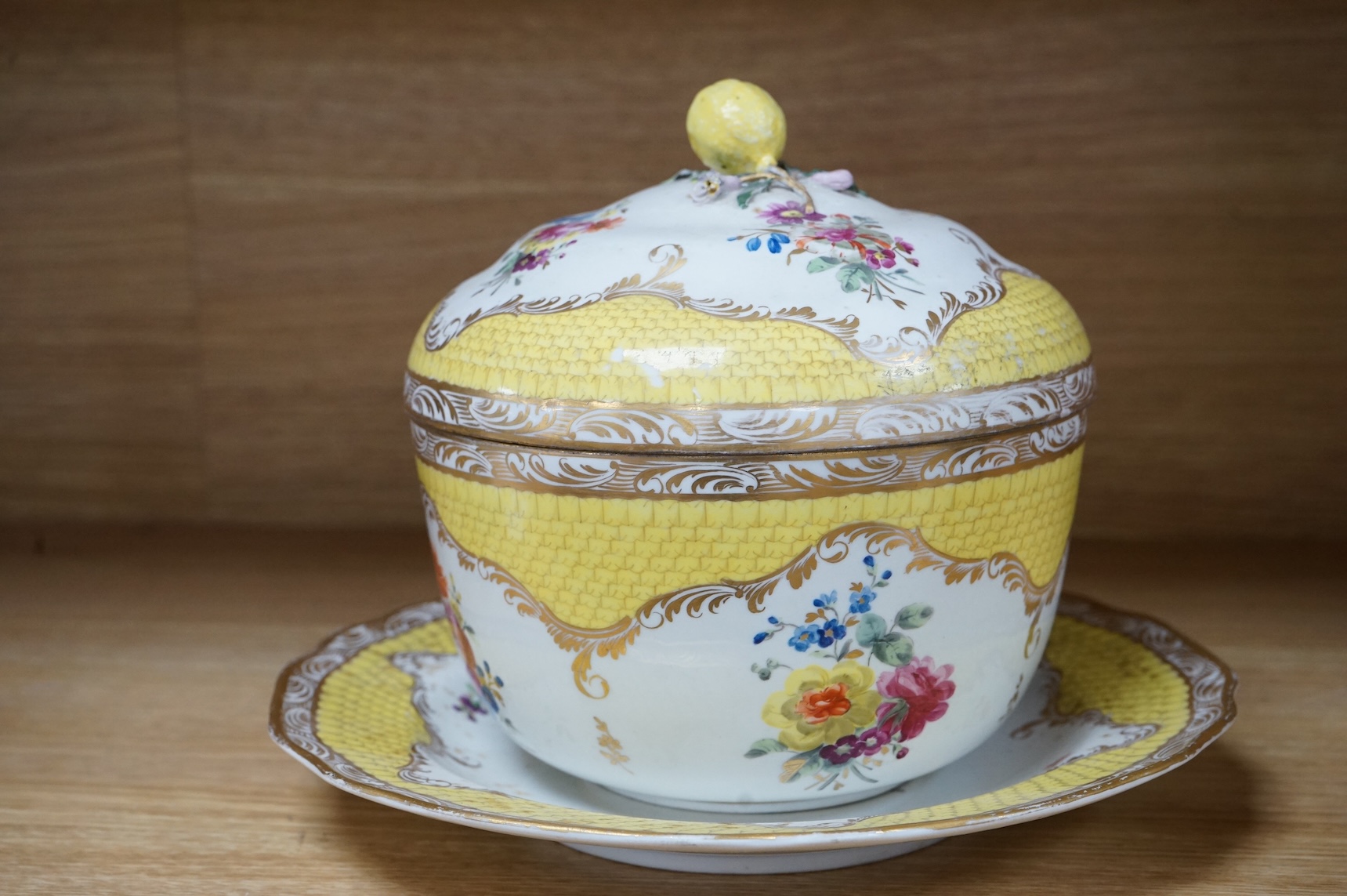 A late 18th century Vienna porcelain ecuelle, cover and stand, hand painted with flowers, 24cm in diameter